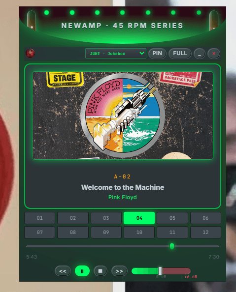 NewAmp's 45 RPM Jukebox deck skin, showing a track grid and backlit playback controls